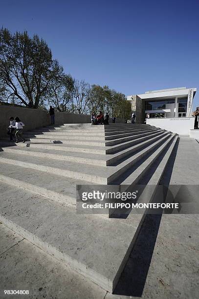 Children play by the Ara Pacis museum on April 7, 2010 in Rome. Rome's mayor Gianni Alemanno, who called the building in 2006 "a scar in the heart of...