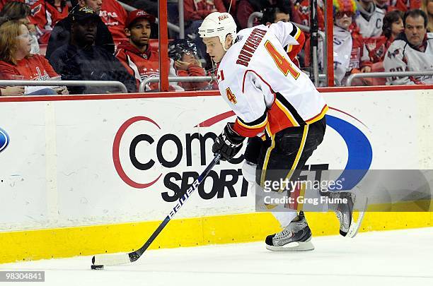 Jay Bouwmeester of the Calgary Flames handles the puck against the Washington Capitals at the Verizon Center on March 28, 2010 in Washington, DC.