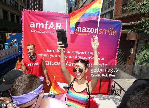 Victoria Justice celebrates on the amfAR amazon float as amfAR Celebrates NYC Pride 2018 on June 24, 2018 in New York City.