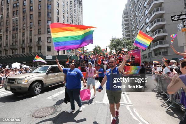 Marchers at amfAR Celebrates NYC Pride 2018 on June 24, 2018 in New York City.