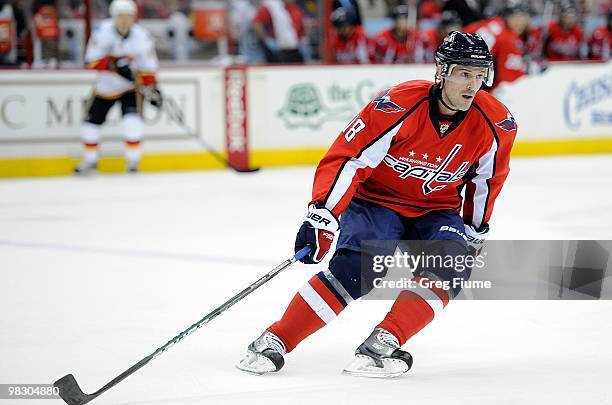 Eric Belanger of the Washington Capitals skates down the ice against the Calgary Flames at the Verizon Center on March 28, 2010 in Washington, DC.