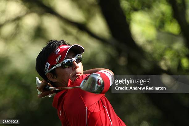 Ryo Ishikawa of Japan watches a shot during a practice round prior to the 2010 Masters Tournament at Augusta National Golf Club on April 7, 2010 in...