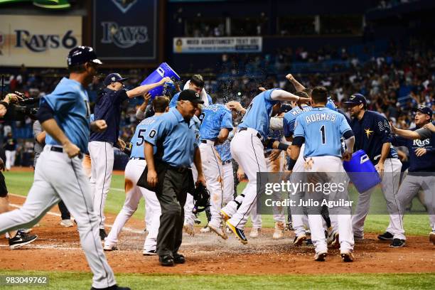 Jake Bauers of the Tampa Bay Rays hits a game winning homer against the New York Yankees in the twelfth inning on June 24, 2018 at Tropicana Field in...