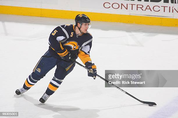 Toni Lydman of the Buffalo Sabres skates with the puck during the game against the Florida Panthers at HSBC Arena on March 31, 2010 in Buffalo, New...