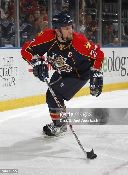 Bryan McCabe of the Florida Panthers carries the puck behind the net against the Ottawa Senators on April 6, 2010 at the BankAtlantic Center in...