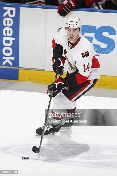 Chris Campoli of the Ottawa Senators skates with the puck against the Florida Panthers on April 6, 2010 at the BankAtlantic Center in Sunrise,...