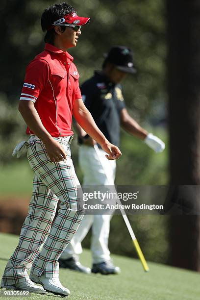 Ryo Ishikawa of Japan walks with Shingo Katayama of Japan during a practice round prior to the 2010 Masters Tournament at Augusta National Golf Club...