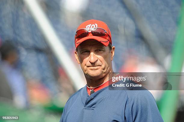 Manager Jim Riggleman of the Washington Nationals watches batting practice before the game against the Philadelphia Phillies on Opening Day at...