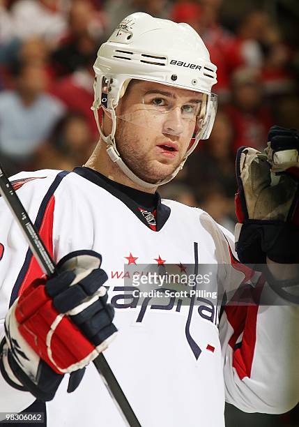Mike Green of the Washington Capitals checks the positoins of his teammates as well as opponents before the an intermission ends during their NHL...