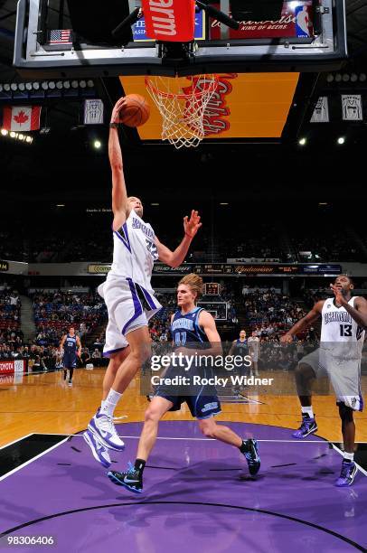 Francisco Garcia of the Sacramento Kings goes to the basket against Andrei Kirilenko of the Utah Jazz during the game on February 26, 2010 at Arco...