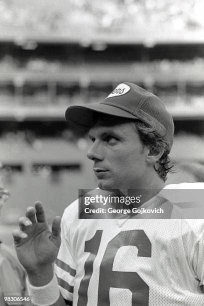 Quarterback Joe Montana of the San Francisco 49ers looks on from the sideline during a National Football League game against the Pittsburgh Steelers...