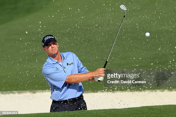 Steve Stricker plays a bunker shot during a practice round prior to the 2010 Masters Tournament at Augusta National Golf Club on April 7, 2010 in...