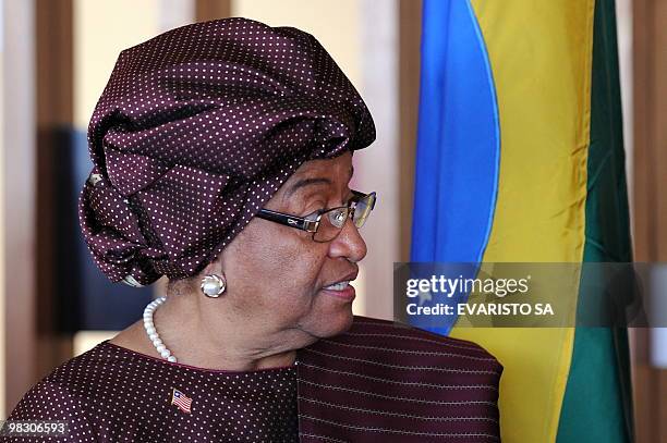 Liberia's President Ellen Johnson Sirleaf speaks with Brazil's President Luiz Inacio Lula da Silva during a meeting at Itamataty Palace in Brasilia,...
