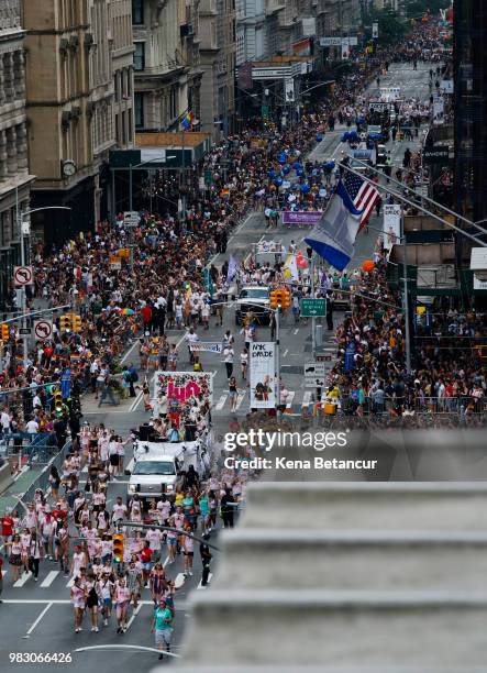 Revellers take part in the annual Pride Parade on June 24, 2018 in New York City. The first gay pride parade in the U.S. Was held in Central Park on...