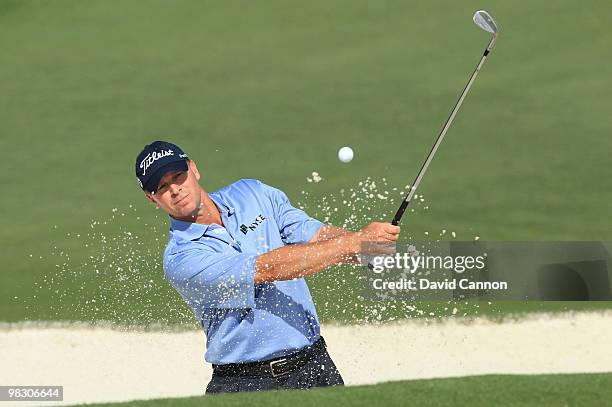 Steve Stricker plays a bunker shot during a practice round prior to the 2010 Masters Tournament at Augusta National Golf Club on April 7, 2010 in...