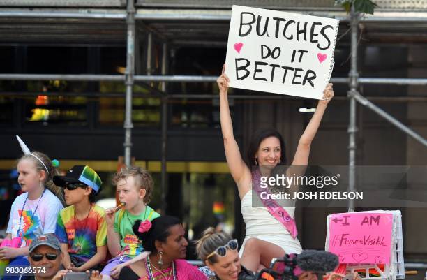 Woman holds up a sign during the San Francisco gay pride parade in San Francisco, California on June 2018.