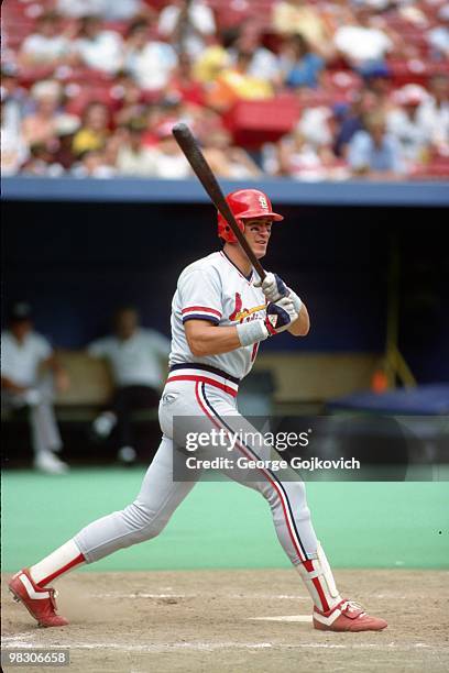 Clint Hurdle of the St. Louis Cardinals bats against the Pittsburgh Pirates during a Major League Baseball game at Three Rivers Stadium in 1986 in...