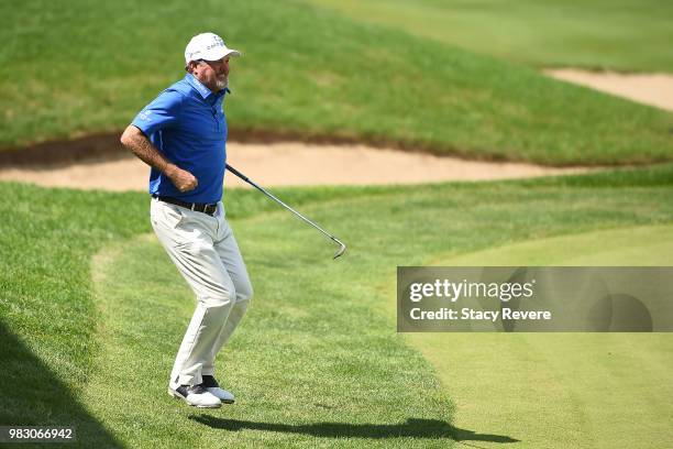 Jerry Kelly reacts to a missed birdie chip on the 18th green during the third and final round of the American Family Championship at University Ridge...