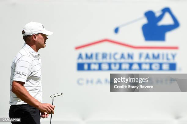 Steve Stricker walks across the 18th green during the third and final round of the American Family Championship at University Ridge Golf Course on...