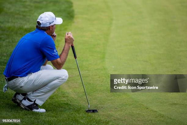 Jerry Kelly lines up his par putt at the 18th green during American Family Insurance Championship on June 24th, 2018 at the University Ridge Golf...