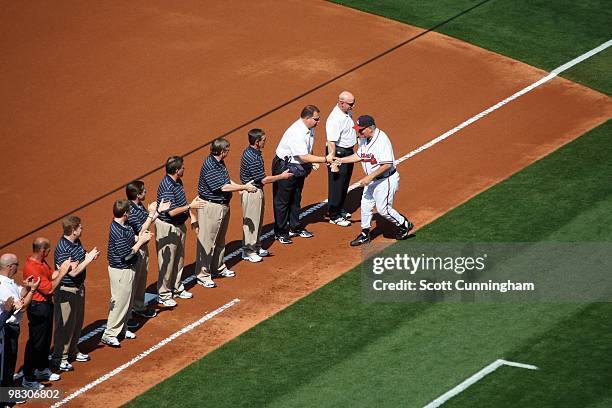 Manager Bobby Cox of the Atlanta Braves is introduced before the game against the Chicago Cubs during Opening Day at Turner Field on April 5, 2010 in...