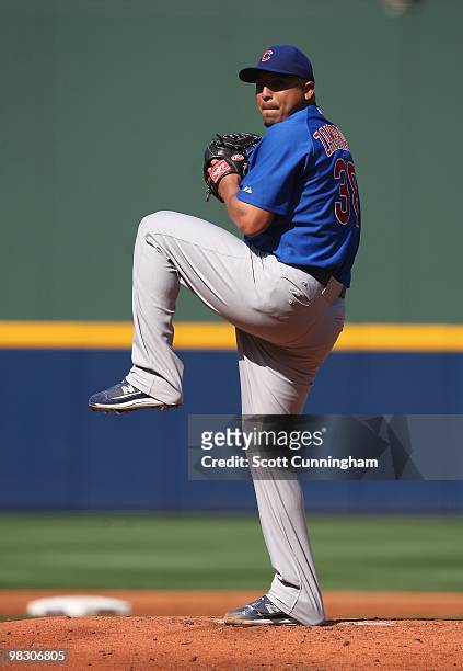 Carlos Zambrano of the Chicago Cubs pitches against the Atlanta Braves during Opening Day at Turner Field on April 5, 2010 in Atlanta, Georgia.