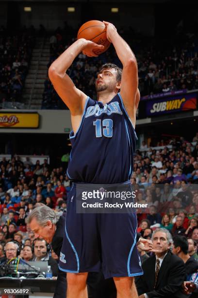 Mehmet Okur of the Utah Jazz shoots against the Sacramento Kings during the game on February 26, 2010 at Arco Arena in Sacramento, California. The...