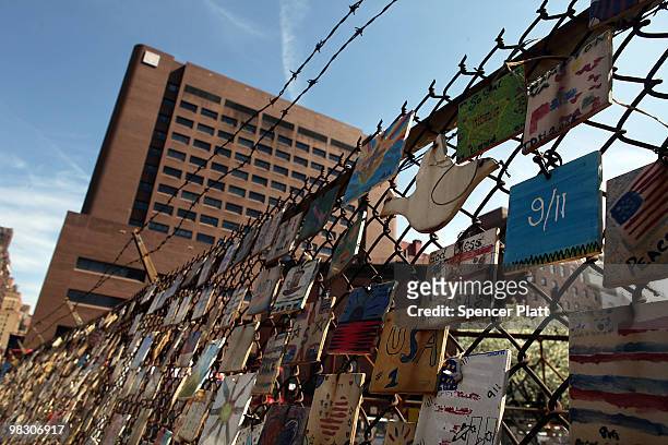 Hundreds of ceramic plates pay homage to the victims of the September 11 attacks on a fence next to St. Vincent's Hospital, the hospital closest to...