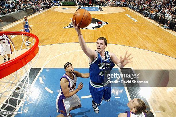 Kevin Love of the Minnesota Timberwolves goes to the basket against Jared Dudley of the Phoenix Suns during the game on March 28, 2010 at the Target...