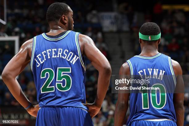 Al Jefferson and Jonny Flynn of the Minnesota Timberwolves stand on the court during the game against the Phoenix Suns on March 28, 2010 at the...