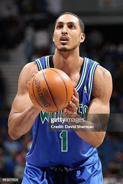 Ryan Hollins of the Minnesota Timberwolves shoots a free throw against the Phoenix Suns during the game on March 28, 2010 at the Target Center in...