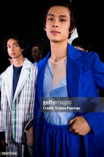 Models pose backstage prior the Kenzo Menswear Spring Summer 2019 show as part of Paris Fashion Week on June 24, 2018 in Paris, France.