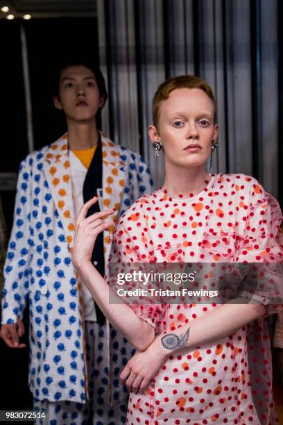 Models pose backstage prior the Kenzo Menswear Spring Summer 2019 show as part of Paris Fashion Week on June 24, 2018 in Paris, France.