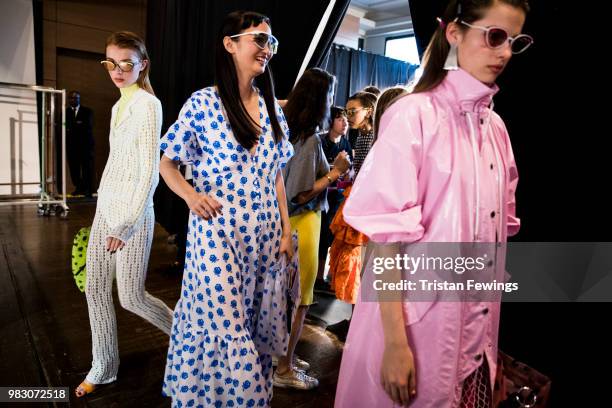 Models pose backstage prior the Kenzo Menswear Spring Summer 2019 show as part of Paris Fashion Week on June 24, 2018 in Paris, France.