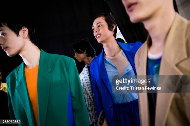 Models pose backstage prior the Kenzo Menswear Spring Summer 2019 show as part of Paris Fashion Week on June 24, 2018 in Paris, France.