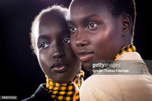 Models pose backstage prior the Kenzo Menswear Spring Summer 2019 show as part of Paris Fashion Week on June 24, 2018 in Paris, France.