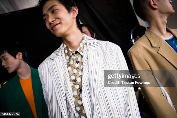 Models pose backstage prior the Kenzo Menswear Spring Summer 2019 show as part of Paris Fashion Week on June 24, 2018 in Paris, France.