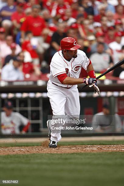 Miguel Cairo of the Cincinnati Reds connects during the fifth inning of the game between the St. Louis Cardinals and the Cincinnati Reds at Great...