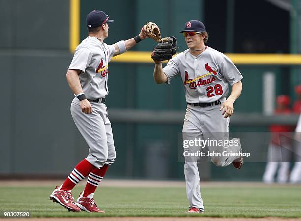 Colby Rasmus of the St. Louis Cardinals celebrates during the game between the St. Louis Cardinals and the Cincinnati Reds at Great American Ball...