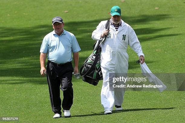 Ian Woosnam of Wales walks with his caddie during the Par 3 Contest prior to the 2010 Masters Tournament at Augusta National Golf Club on April 7,...