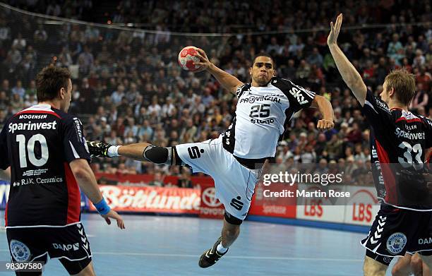 Daniel Narcisse of Kiel throws at goal during the Toyota Handball Bundesliga match between THW Kiel and SG Flensburg-Handewitt at the Sparkassen...