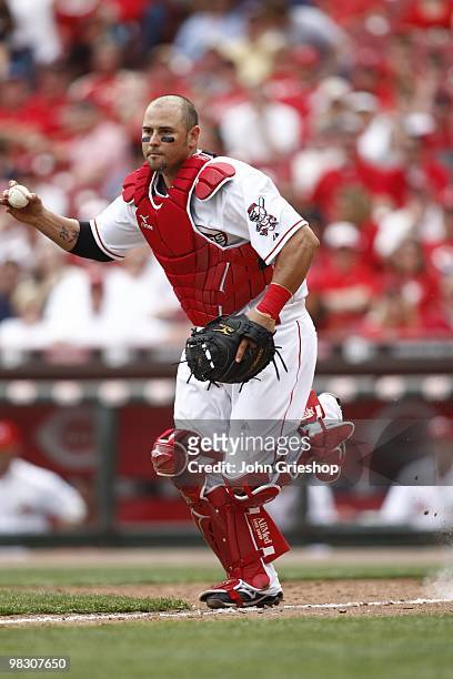 Ramon Hernandez of the Cincinnati Reds chases down the runner during the game between the St. Louis Cardinals and the Cincinnati Reds at Great...