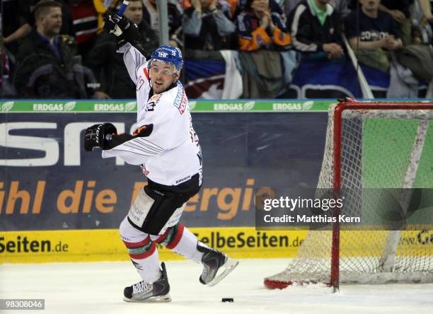 Colin Murphy of Augsburg jubilates after team mate Darin Olver scoring the fifth goal during the fifth DEL quarter final play-off game between...