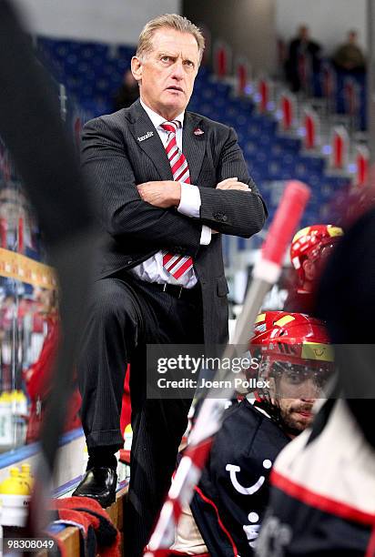 Head coach Hans Zach of Hannover looks on during the fifth DEL quarter final play-off game between Hannover Scorpions and Thomas Sabo Ice Tigers at...