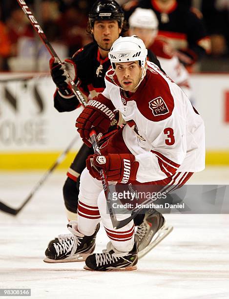 Keith Yandle of the Phoenix Coyotes turns to chase the puck against the Chicago Blackhawks at the United Center on March 23, 2010 in Chicago,...