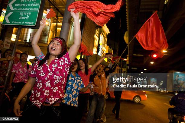 Red shirt supporters of former PM Thaksin Shinawatra defy the government for a fifth day by taking over the streets of the city's main shopping...