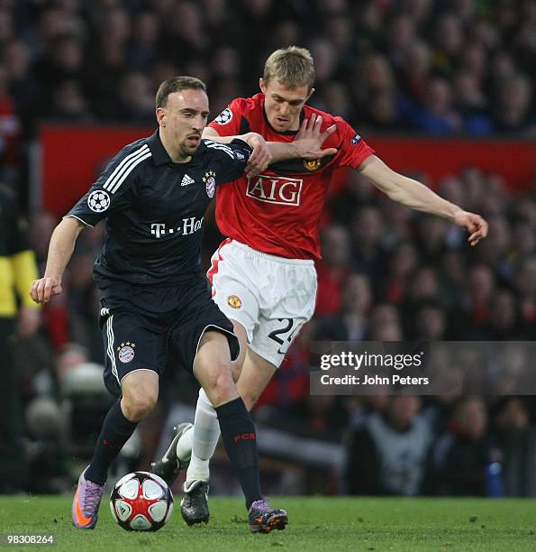 Darren Fletcher of Manchester United clashes with Franck Ribery of Bayern Munich during the UEFA Champions League Quarter-Final Second Leg match...