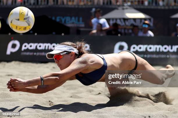 Betsi Flint dives for the ball while competing against April Ross and Caitlin Ledoux during the Women's Championship game of the AVP Seattle Open at...