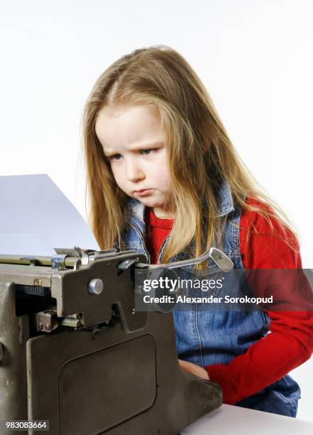 Girl Using Typewriter 250 Girl Typewriter Stock Photos, High-Res Pictures, and Images - Getty ...