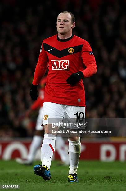 Wayne Rooney of Manchester United walks with care during the UEFA Champions League Quarter Final second leg match between Manchester United and...